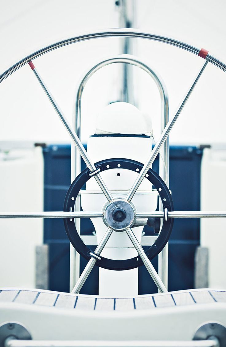 Polished sailboat helm, a refined old-money detail reflecting YQR Design's premium craft